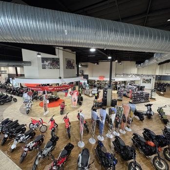 Fun Bike Center showroom floor with motorcycles on display